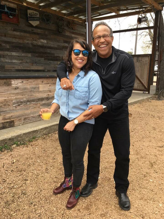 A photo of my dad and me at my birthday celebration, smiling and sharing a joyful moment. He’s holding me close, and we’re surrounded by love, laughter, and the warmth of family.